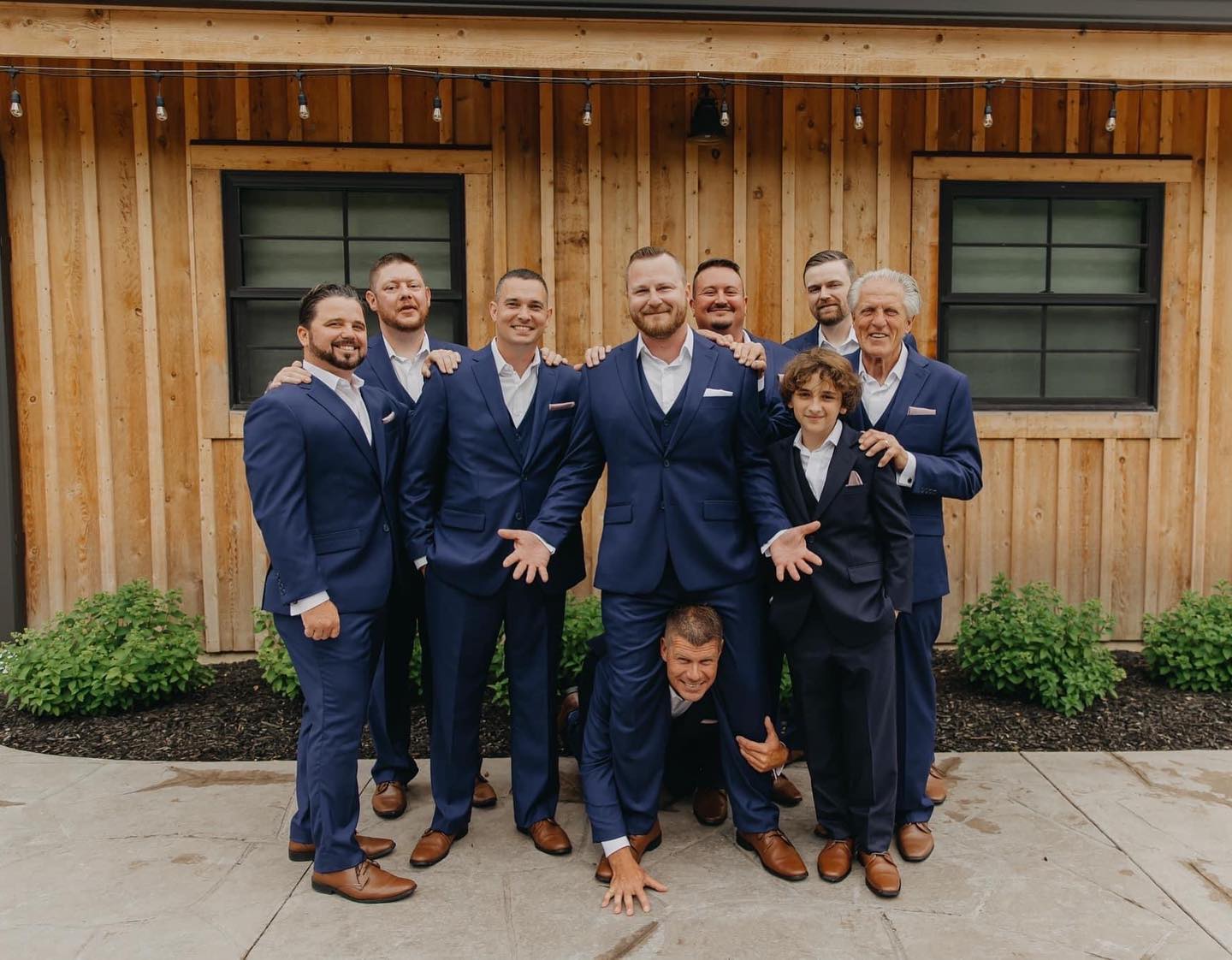 group of men wearing navy blue dress suits